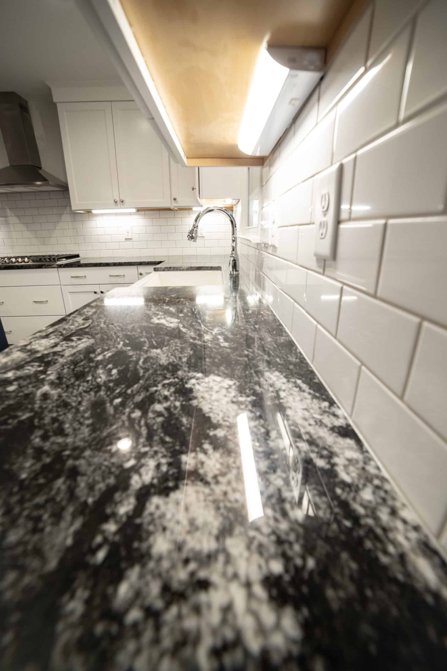 Granite Countertop and Subway Tile Backsplash